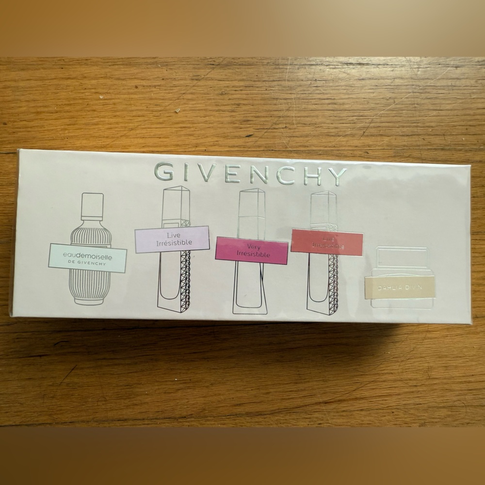 Givenchy set of 5 perfume gift set new in box with the plastic on.